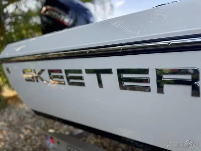 Slide: The Image of Close-up of 2024 Skeeter SX230 boat logo. - 11