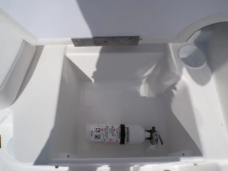 Slide: The Image of 2024 Tahoe T18 storage compartment with fire extinguisher. - 8