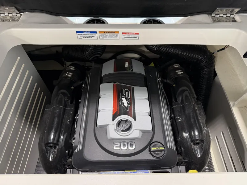 Slide: The Image of 2023 Sea Ray SPX 210 boat engine compartment with 4.5L 200 HP engine. - 15