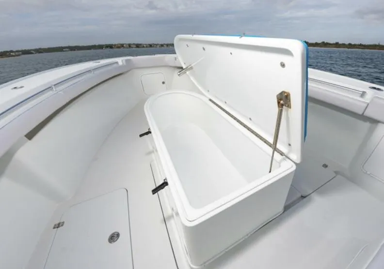 Slide: The Image of 2018 Yellowfin 39 boat with open storage compartment. - 10