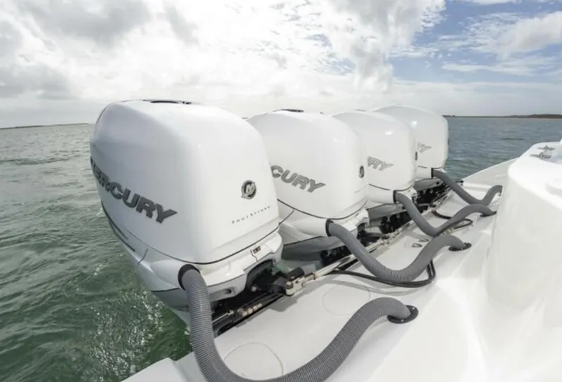 Slide: The Image of 2018 Yellowfin 39 boat with four Mercury outboard engines on the water. - 20