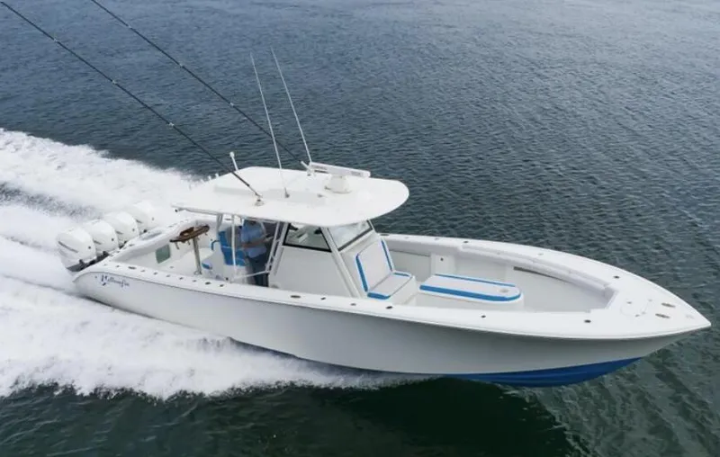 Slide: The Image of 2018 Yellowfin 39 boat cruising on water. - 3