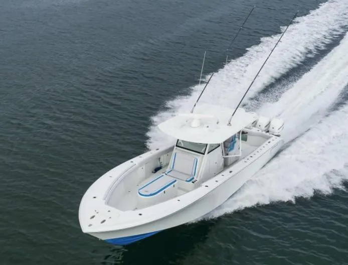 Slide: The Image of 2018 Yellowfin 39 boat cruising on open water. - 6