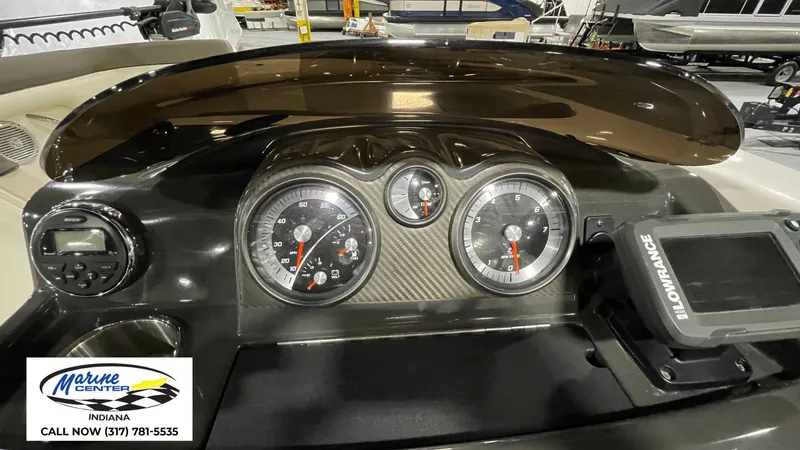 Slide: The Image of Dashboard of 2019 Bayliner 190 Deck Boat with gauges and Lowrance device. - 10