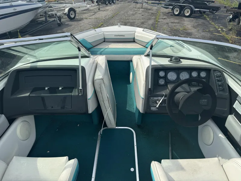 Slide: The Image of Interior of a 1993 Chaparral 2000SL boat with steering wheel and dashboard. - 4