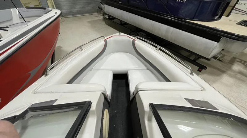 Slide: The Image of 1996 Tigé PRE2002WT boat interior with white seating and sleek design. - 10