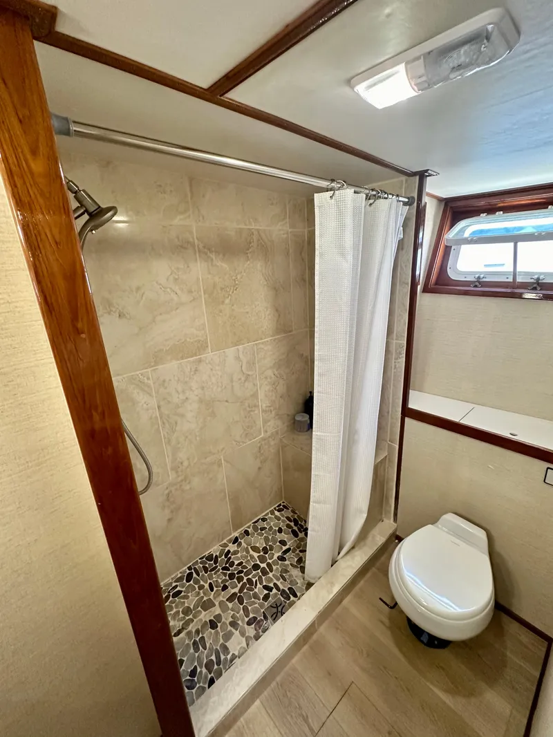 Slide: The Image of Bathroom in 1976 Ditmar & Donaldson Custom Yachtfisher with shower and toilet. - 28