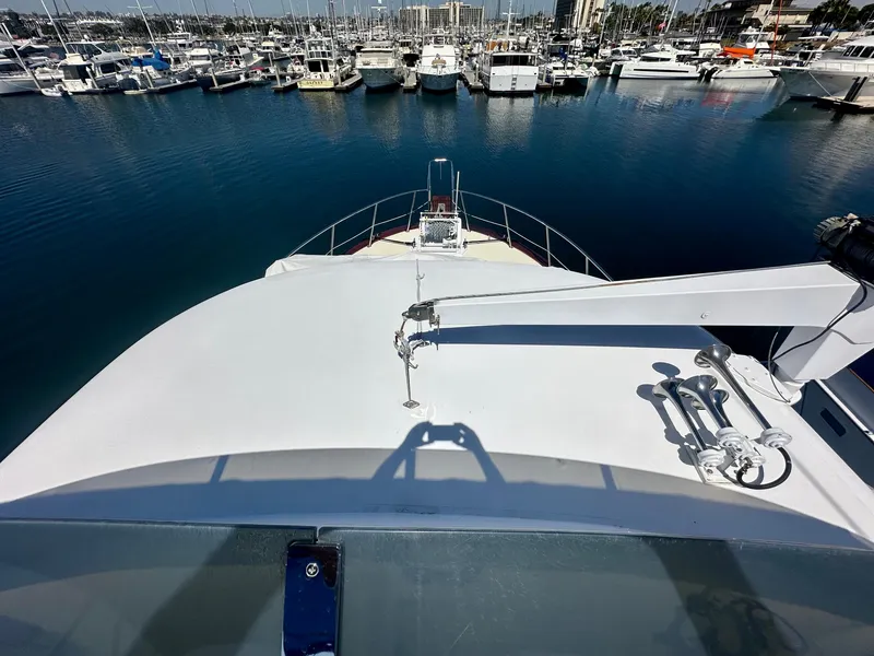 Slide: The Image of 1976 Ditmar & Donaldson Custom Yachtfisher docked at a marina, viewed from the deck. - 5