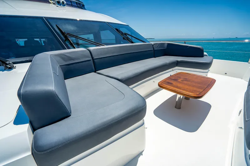 Slide: The Image of 2018 Princess Y75 Motor Yacht deck with seating and table. - 31