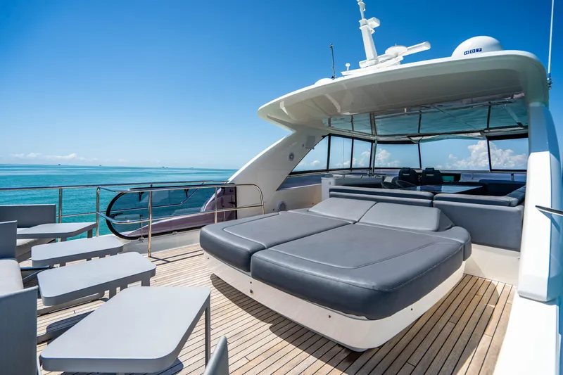 Slide: The Image of Luxurious deck of 2018 Princess Y75 Motor Yacht with sun loungers and ocean view. - 37