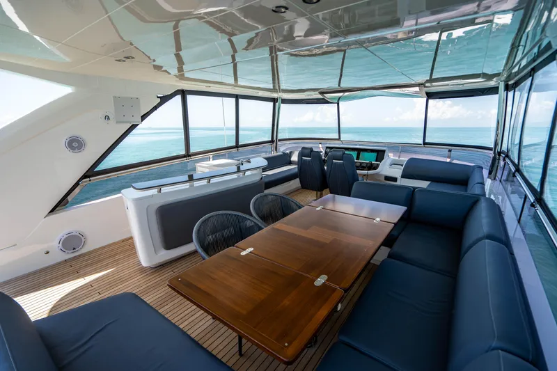 Slide: The Image of 2018 Princess Y75 Motor Yacht interior with luxurious seating and ocean view. - 39
