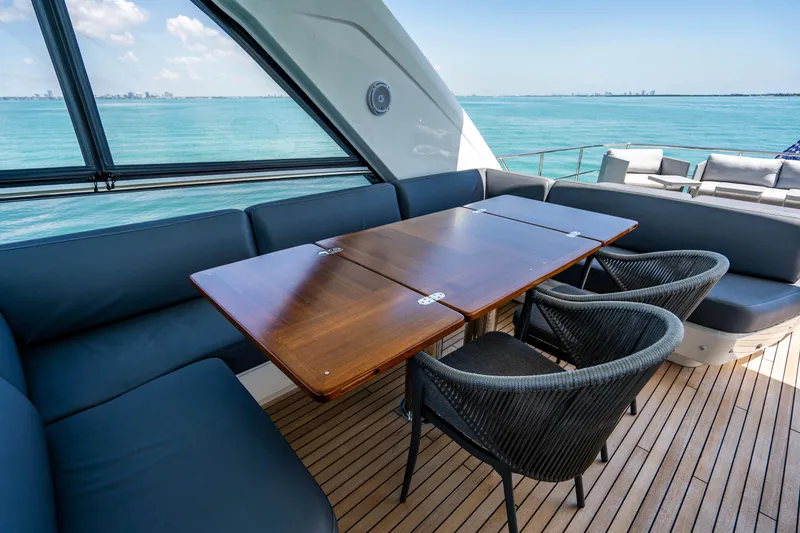 Slide: The Image of 2018 Princess Y75 Motor Yacht interior dining area with ocean view. - 49