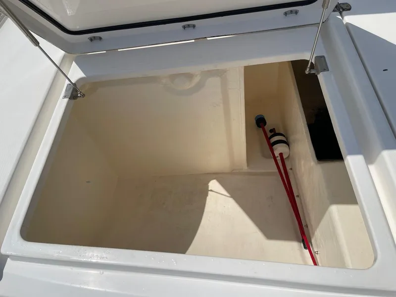 Slide: The Image of Open storage compartment on a 2020 Leopard 50 yacht. - 24
