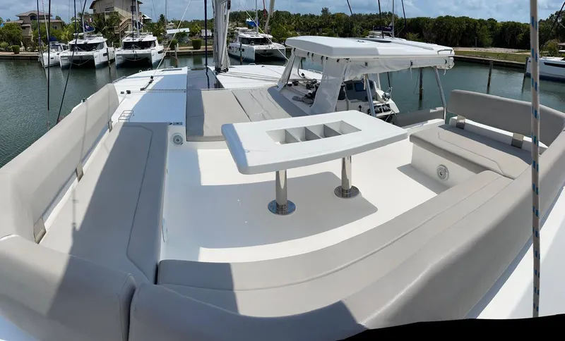 Slide: The Image of Leopard 50 yacht 2020 model with spacious deck and seating area in marina. - 27