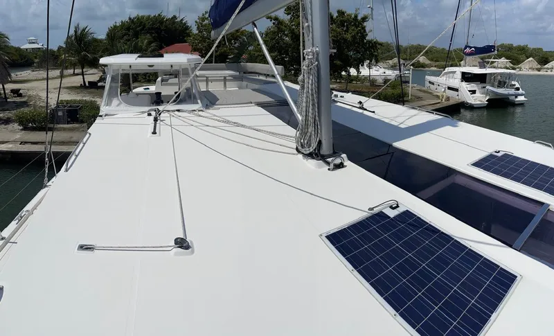 Slide: The Image of 2020 Leopard 50 yacht with solar panels docked at marina. - 29