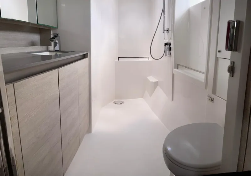 Slide: The Image of Modern bathroom in a 2020 Leopard 50 yacht with sleek fixtures and minimalist design. - 40