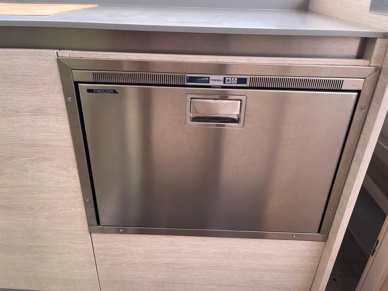 Slide: The Image of Built-in stainless steel dishwasher, Leopard 50 model, 2020, installed in modern kitchen cabinetry. - 43