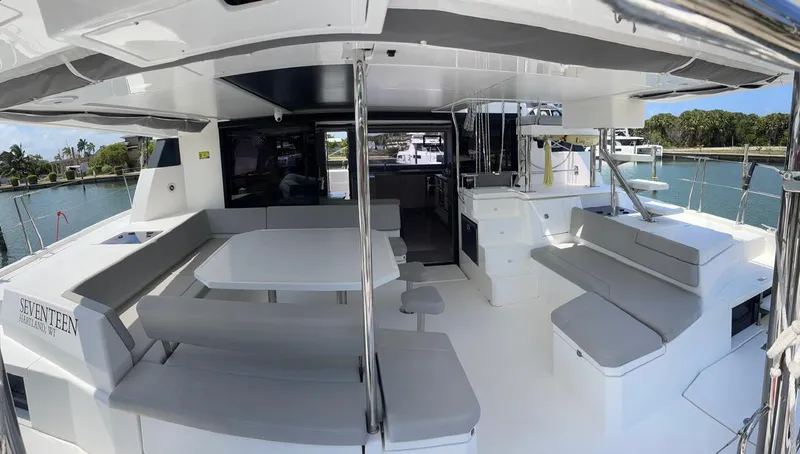 Slide: The Image of Leopard 50 catamaran 2020 model, spacious outdoor seating and dining area with modern design. - 48
