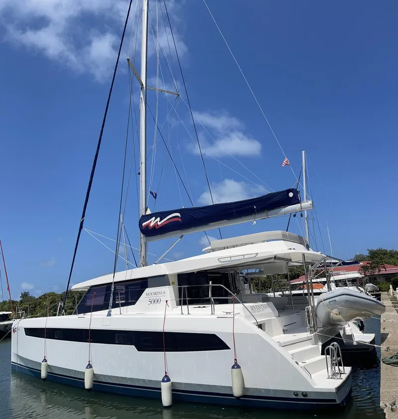 Slide: The Image of Leopard 50 catamaran yacht docked at marina, 2020 model. - 7