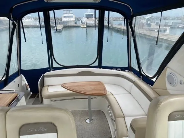 Slide: The Image of Interior of a 2012 Sea Ray 370 Sundancer yacht with marina view. - 5
