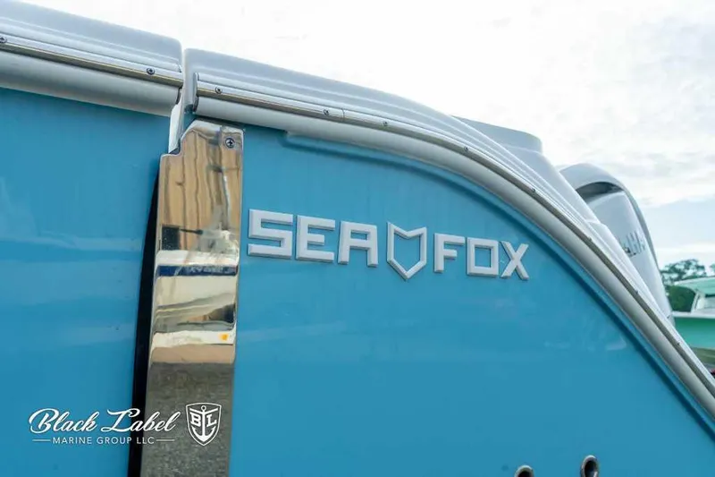 Slide: The Image of 2025 Sea Fox 328 Commander Center Console boat side view. - 1