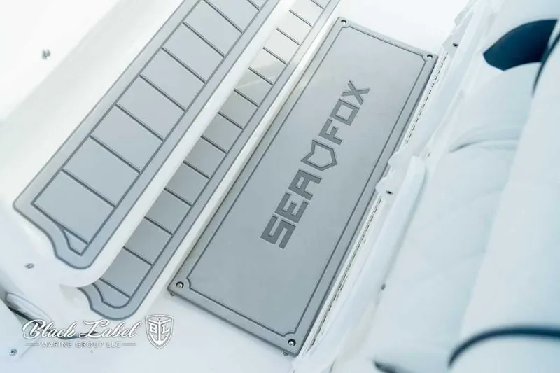 Slide: The Image of 2025 Sea Fox 328 Commander Center Console boat deck with logo. - 21