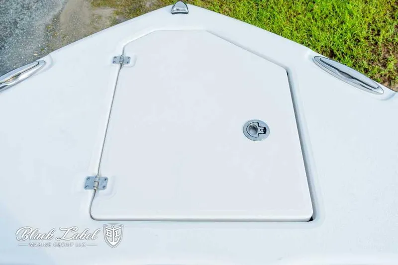 Slide: The Image of 2025 Sea Fox 328 Commander Center Console bow storage compartment. - 6