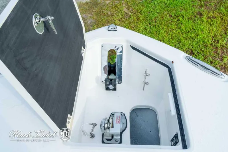 Slide: The Image of Open anchor locker of 2025 Sea Fox 328 Commander Center Console boat. - 7