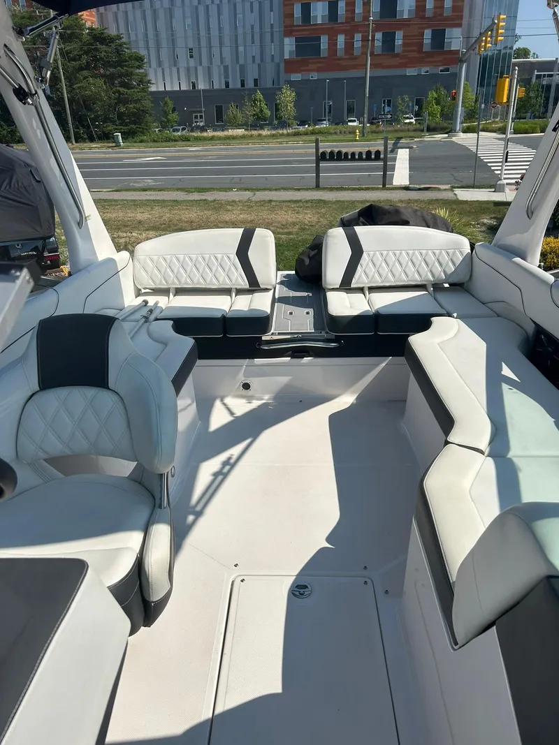 Slide: The Image of 2018 Regal 2300 Bowrider with spacious seating and modern design. - 12
