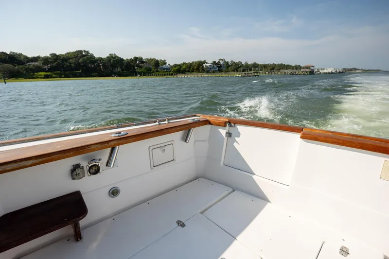 Slide: The Image of 1998 Little Harbor WhisperJet 36 cruising on a scenic waterway. - 13