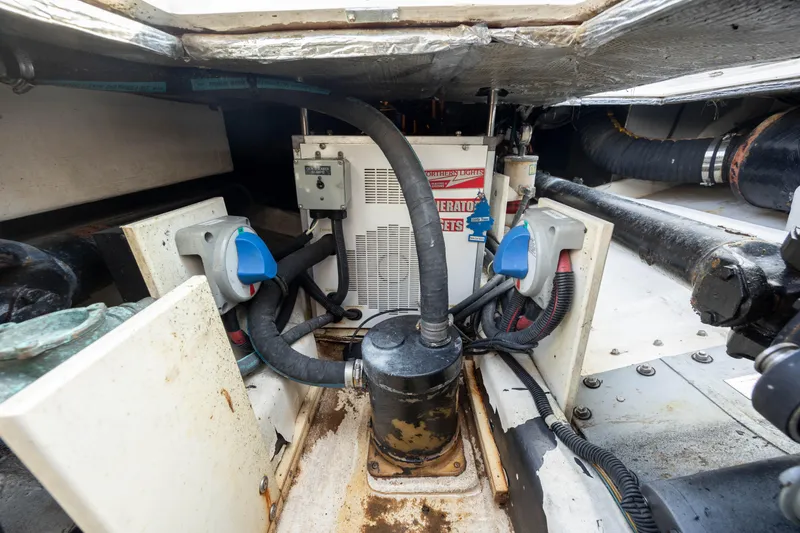 Slide: The Image of Engine compartment of a 1998 Little Harbor WhisperJet 36 boat. - 39