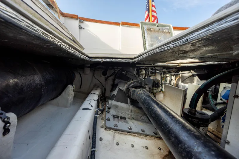 Slide: The Image of Engine compartment of a 1998 Little Harbor WhisperJet 36 boat. - 40