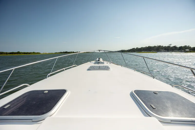 Slide: The Image of Bow view of 1998 Little Harbor WhisperJet 36 cruising on a sunny day. - 48