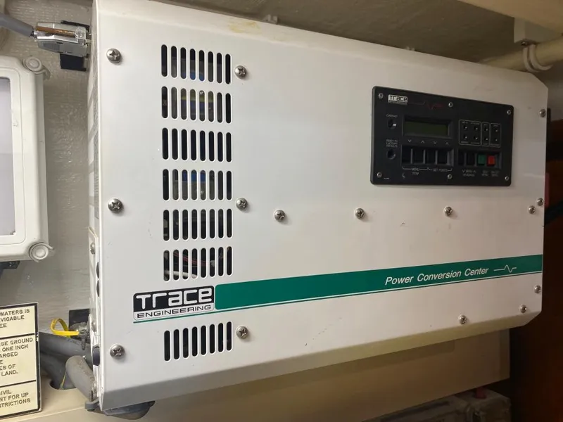 Slide: The Image of Trace Engineering power conversion center in a 2003 West Bay 68 yacht. - 30