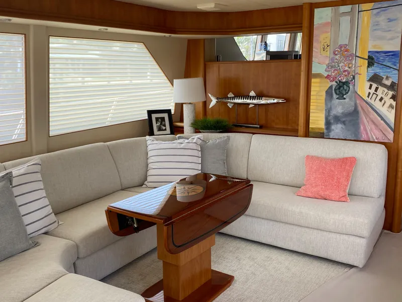 Slide: The Image of Luxurious interior of 2003 West Bay 68 yacht with elegant seating and decor. - 8