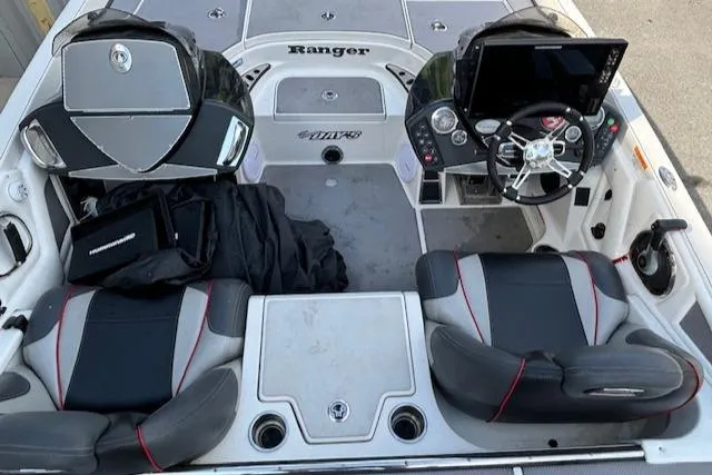 Slide: The Image of 2016 Ranger Z520C boat interior with dual seats and control console. - 10