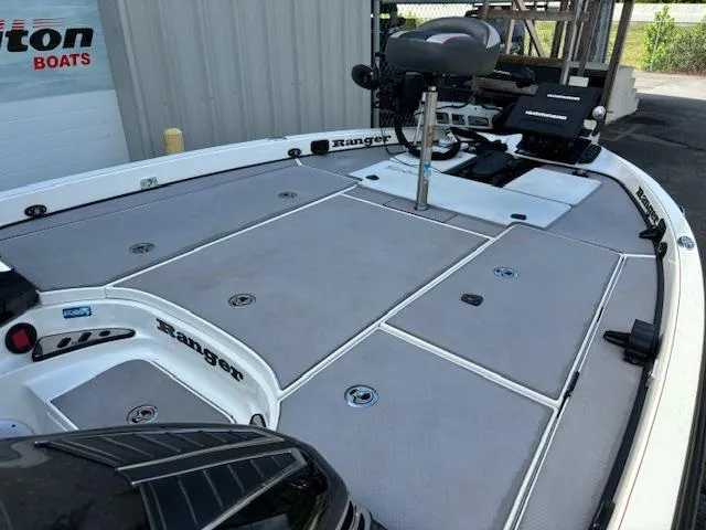 Slide: The Image of 2016 Ranger Z520C fishing boat deck with seating and storage compartments. - 6