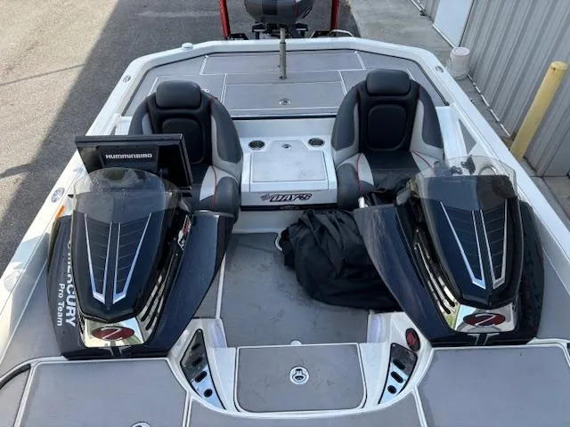 Slide: The Image of 2016 Ranger Z520C boat interior with dual seats and control panels. - 8