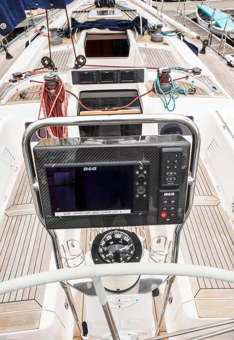 Slide: The Image of Nautor Swan 48 (2001) yacht cockpit with navigation equipment and teak decking. - 13