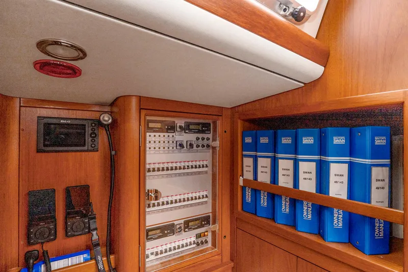 Slide: The Image of Nautor Swan 48 yacht electrical panel and manuals, 2001 model. - 44