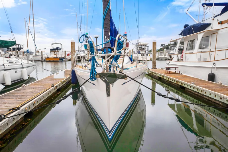 Slide: The Image of Nautor Swan 48 sailboat docked at marina, 2001 model. - 6