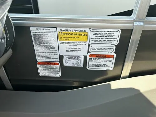 Slide: The Image of 2025 Sun Tracker Fishin' Barge 22 XP3 capacity and safety labels. - 10