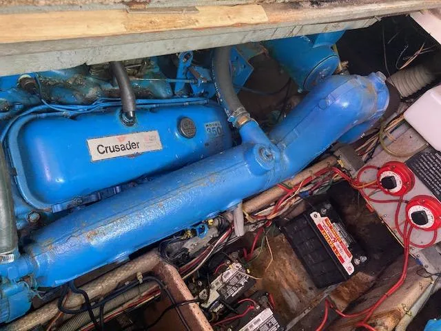 Slide: The Image of Engine compartment of a 1986 Silverton 37 Convertible with Crusader engine. - 16