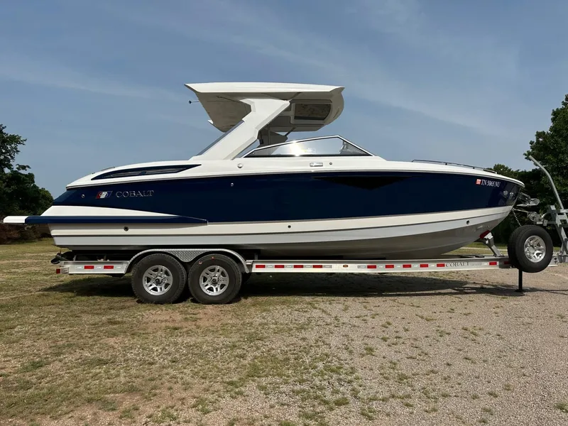 Slide: The Image of 2022 Cobalt A29 boat on a trailer, side view. - 0