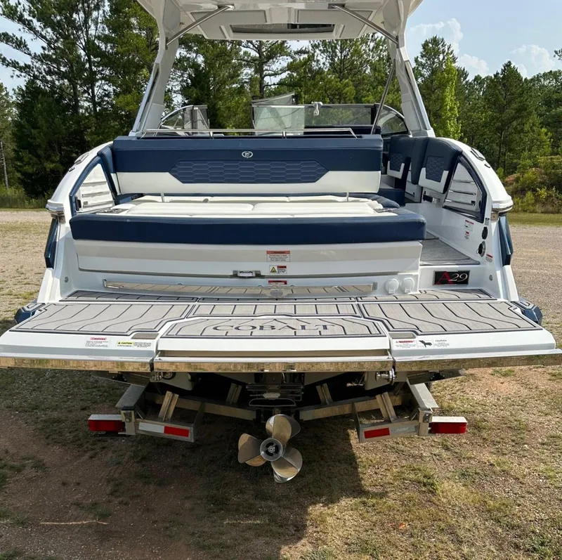 Slide: The Image of 2022 Cobalt A29 boat rear view with swim platform and seating. - 11