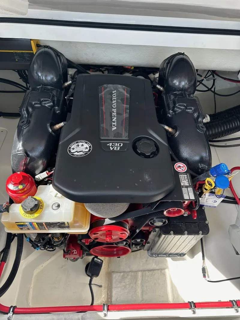 Slide: The Image of 2022 Cobalt A29 boat engine compartment with Volvo Penta V8 engine. - 12