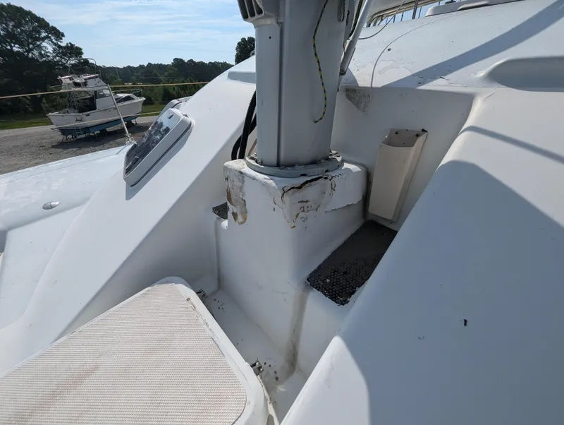 Slide: The Image of Shuttleworth Ocean Cheetah 37, 1998 model, deck view with mast and seating area. - 11