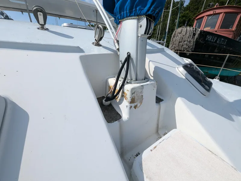 Slide: The Image of Shuttleworth Ocean Cheetah 37 sailboat deck, 1998 model, featuring mast and rigging details. - 12