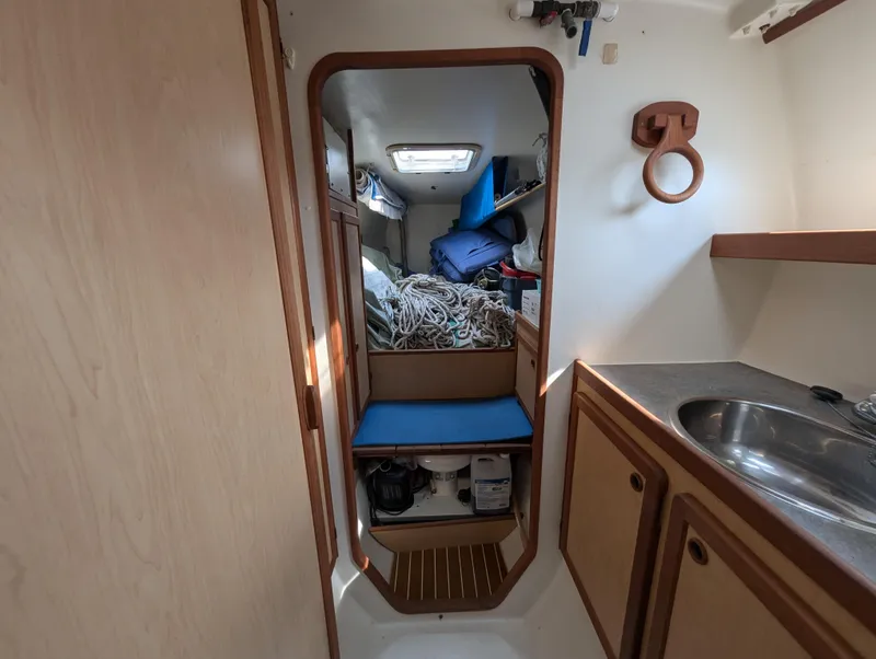 Slide: The Image of Interior of 1998 Shuttleworth Ocean Cheetah 37 sailboat with storage and sink. - 26