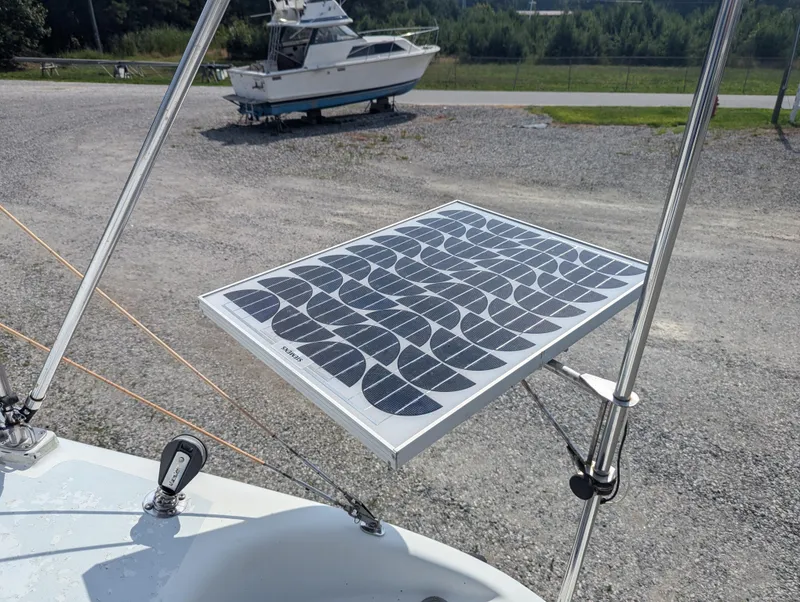 Slide: The Image of Solar panel on Shuttleworth Ocean Cheetah 37 sailboat, 1998 model, in a boatyard setting. - 36